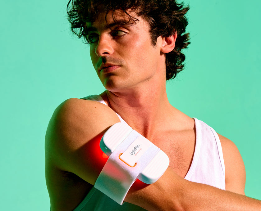Man wearing a LightStim Recovery Loop on his upper arm