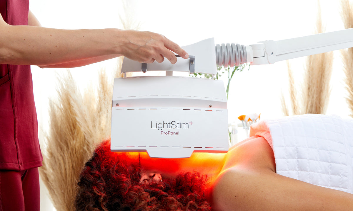 Woman receiving LightStim ProPanel treatment